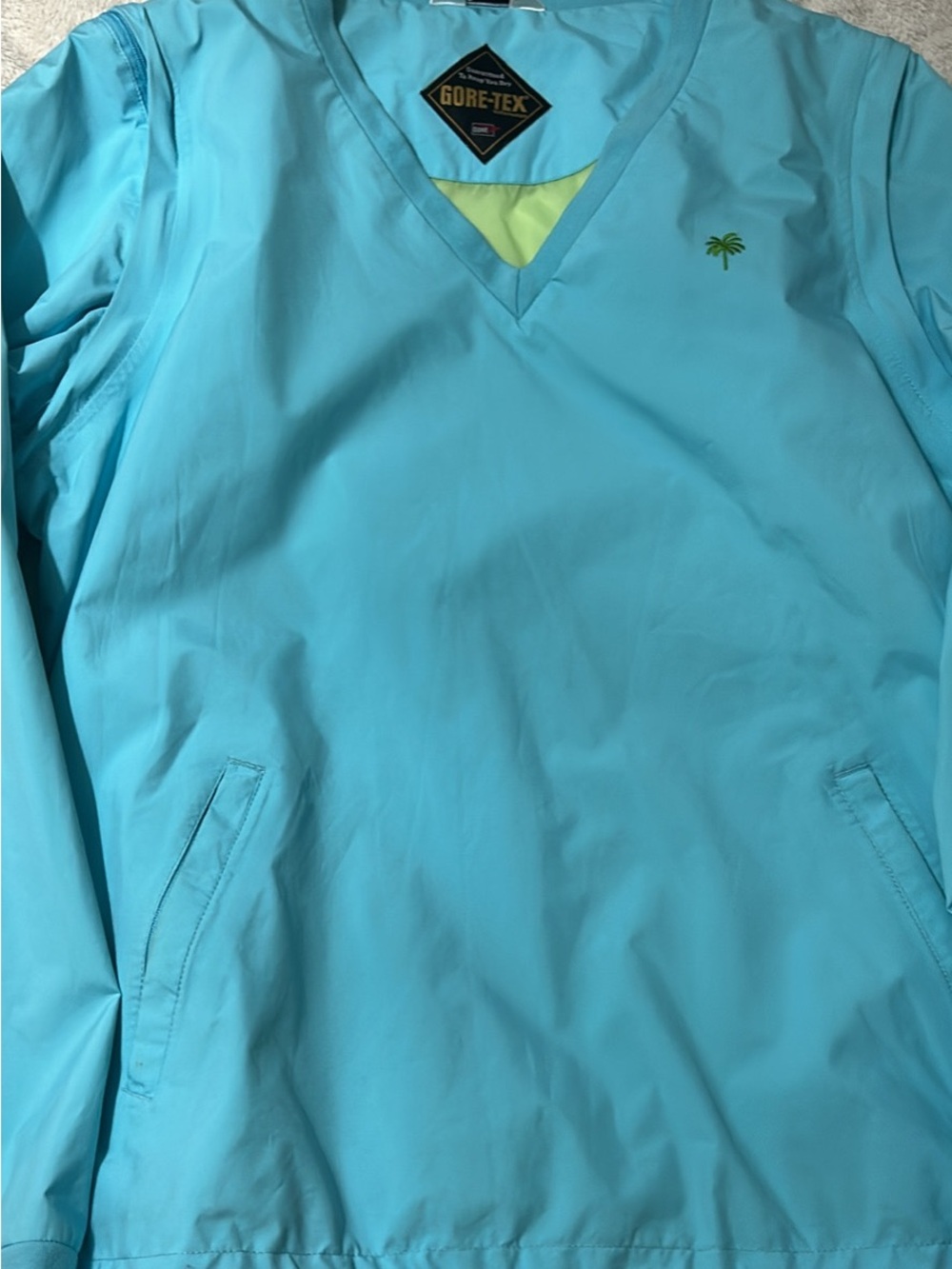 Lily Pulitzer GORE-TEX women’s Aqua Blue V-Neck Pullover with Lime Accent